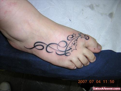 Tribal Tattoo On Right Foot