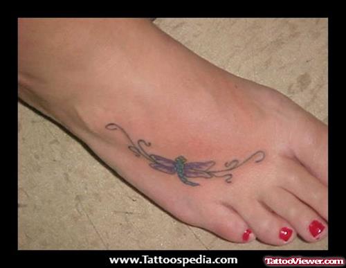 Small Dragonfly Tattoo On Girl Right Foot