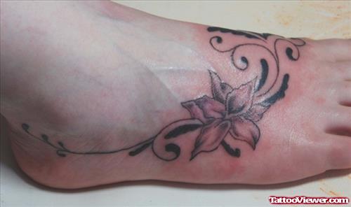 Grey Ink Lily Flower Foot Tattoo