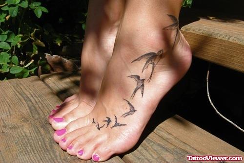 Grey Ink Flying Birds Foot Tattoo