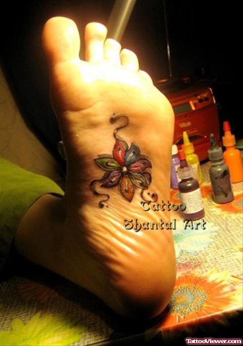 Colored Flower Tattoo Under Foot