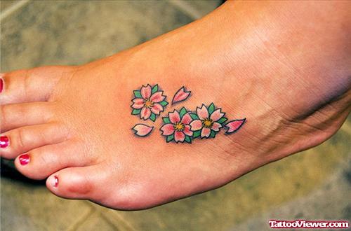 Cherry Blossom Flowers Tattoos On Girl Left Foot