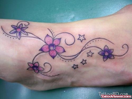 Beautiful Colored Flowers Foot Tattoo