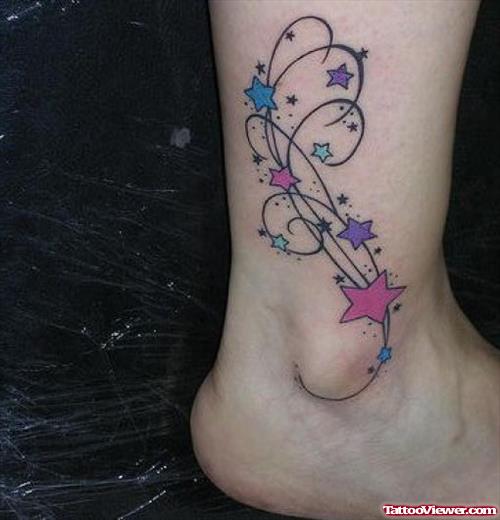 Attractive Colored Stars Foot Tattoo For Girls