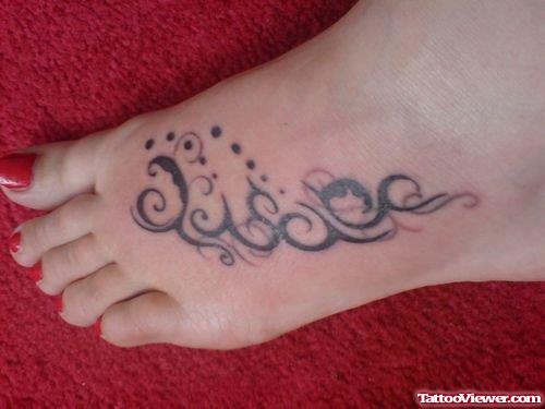 Black Ink Swirl Foot Tattoo