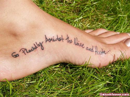 Black Ink Lettering Tattoo on Left Foot