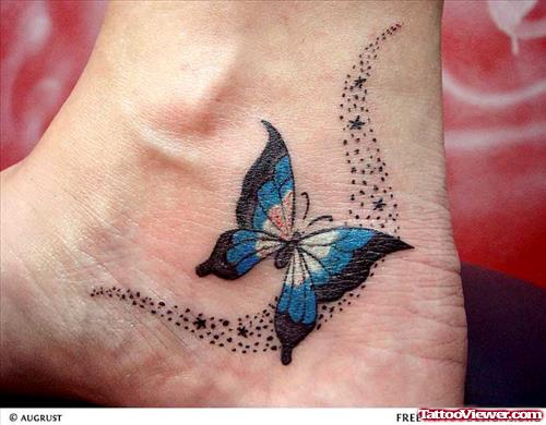 Attractive Colored Butterfly Foot Tattoo