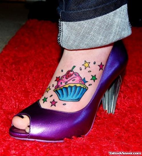 Colored Stars And Cupcake Foot Tattoo