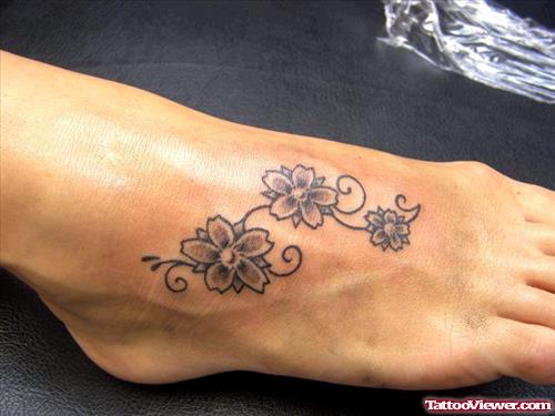 Grey Ink Cherry Blossom Flowers Foot Tattoo