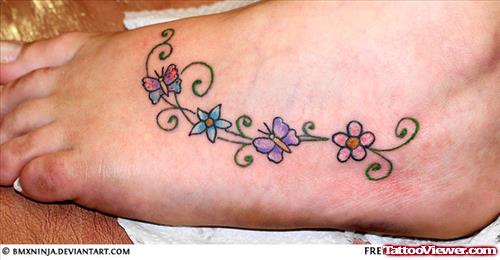 Colored Butterfly And Flowers Foot Tattoo