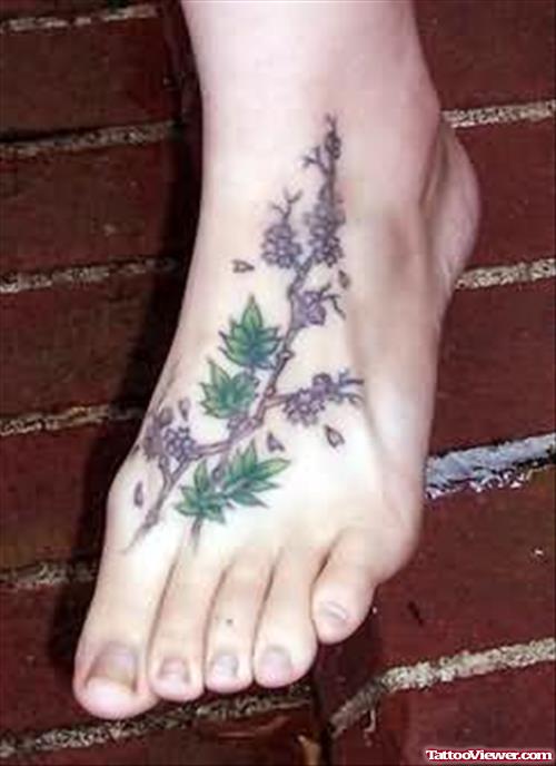Awesome Flowers Vine Tattoo On Foot