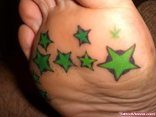 Green Stars Tattoo On Foot