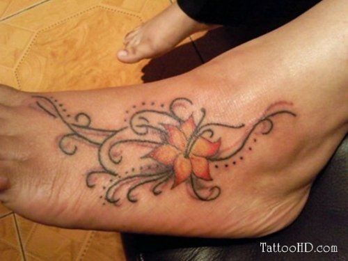 Awesome Colored Flower Left Foot Tattoo