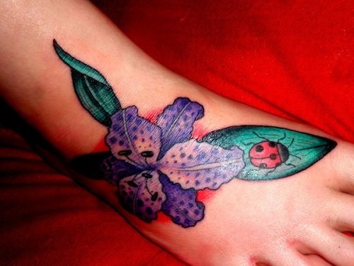 Purple Flower And Bug Foot Tattoo