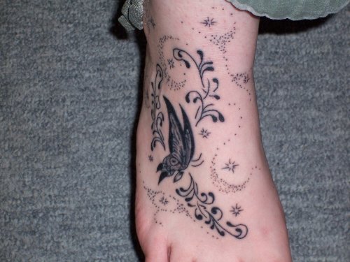 Grey Ink Butterfly Foot Tattoo