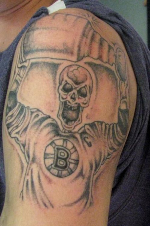 Grey Ink Skull Football Tattoo On Left Half Sleeve