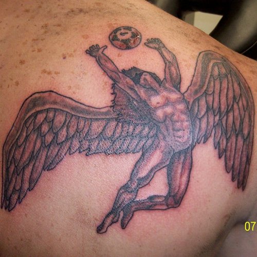 Winged Football Player Tattoo On Back Shoulder