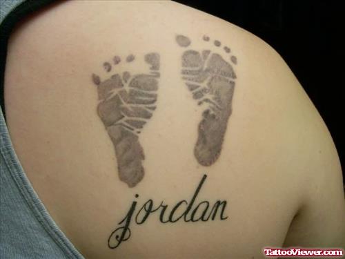 Jordn Foot Prints Tattoo On Back