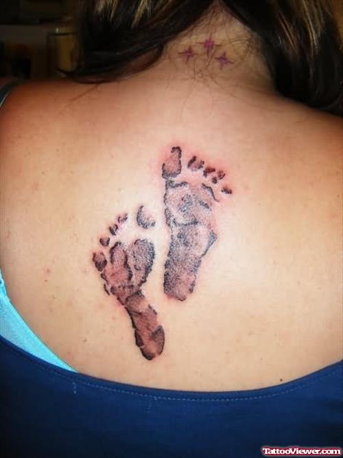 Foot Prints Tattoo On Back