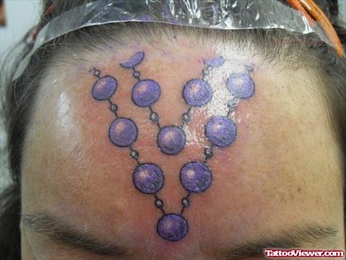 Beads Tattoo On Forehead