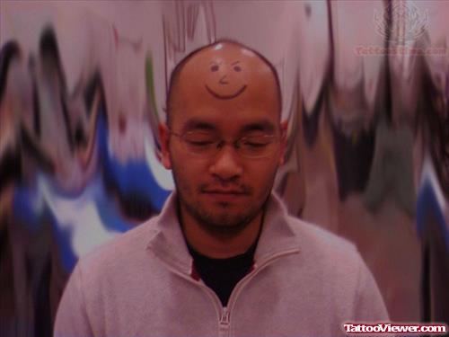 Smiley Tattoo On Forehead