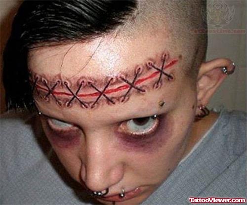 Stiches Tattoo On Forehead