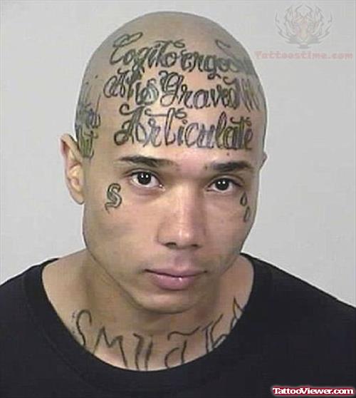 Forehead Stabbed Articulate Forehead Tattoo