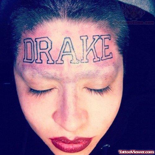 Drake Words Forehead Tattoo