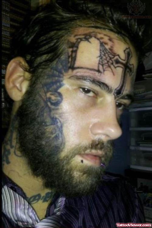 Cross Tattoo On Forehead