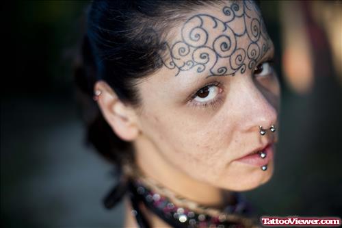 Spiral Tattoos On Forehead