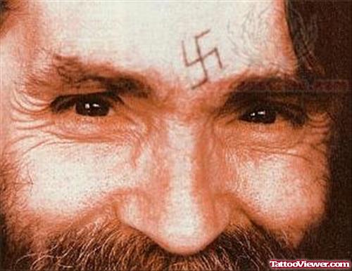 Religious Forehead Tattoo
