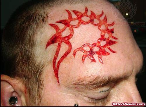 Red Dragon Tattoo On Forehead