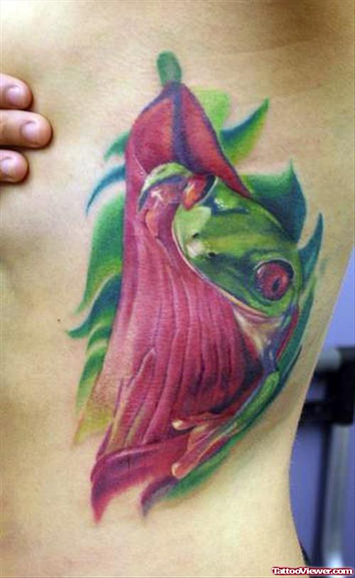 Unique Flower And Frog Tattoo On Side Rib