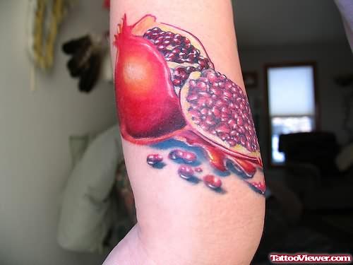 Pomegranate Tattoo On Biceps