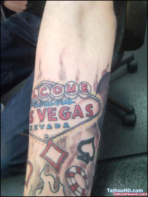 Las Vegas Gambling Tattoo On Left Arm