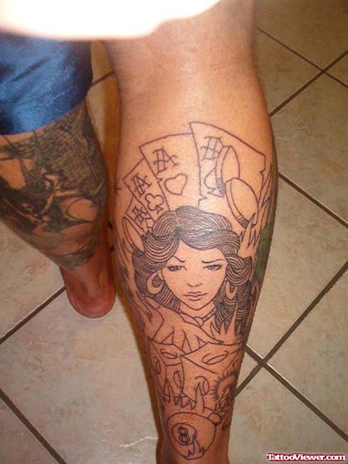 Girl Head And Cards Gambling Tattoo On Right Back Leg