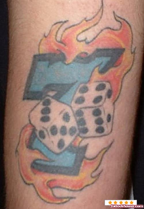 Flaming Seven Number And Dice Gambling Tattoo On Sleeve