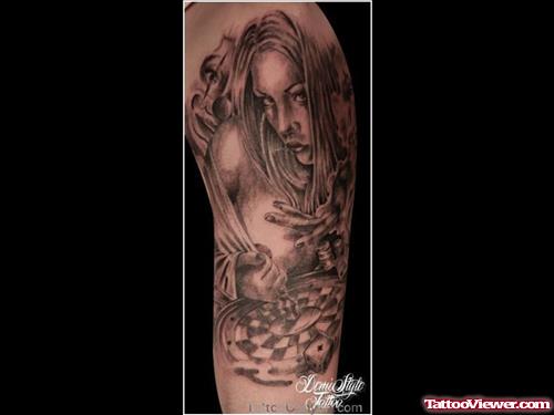 Grey Ink Girl Head Tattoo On Arm