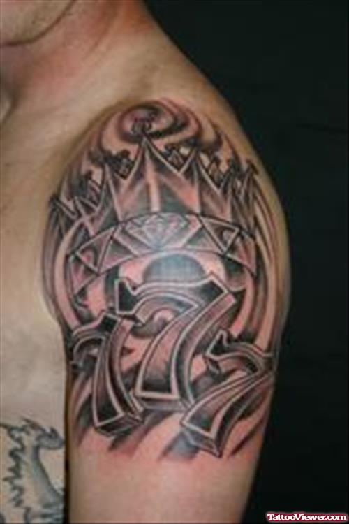 Awesome Grey Ink Gambling Tattoo On Left Shoulder
