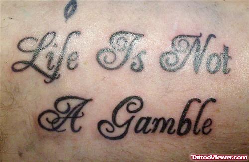 Life Is Not A Gamble Tattoo On Chest