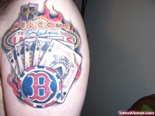 Colored Gambling Tattoo On Left Arm