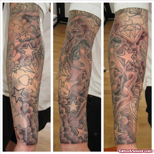 Grey Ink Stars And Cards Gambling Tattoo On Arm