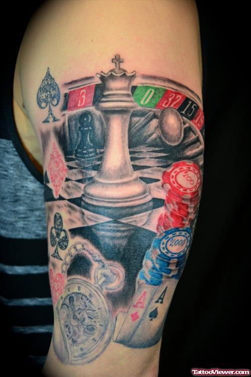 Grey Ink Gambling Tattoo On Left Arm