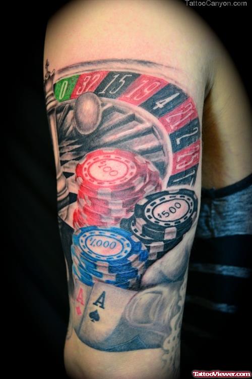 Colored Gambling Tattoo On Left Half Sleeve
