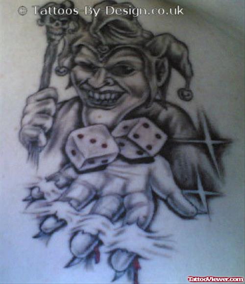 Grey Ink Joker With Dice Gambling Tattoo