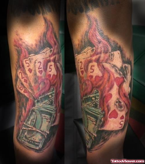 Flaming Money And Cards Gambling Tattoo On Sleeve