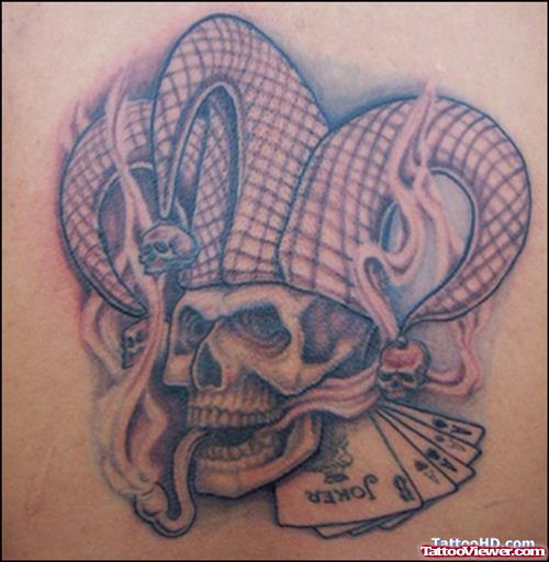 Beautiful Grey Ink Joker Skull Gambling Tattoo