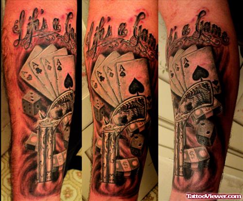 Life Is A Gamble - Gambling Gun And Cards Tattoo On Arm