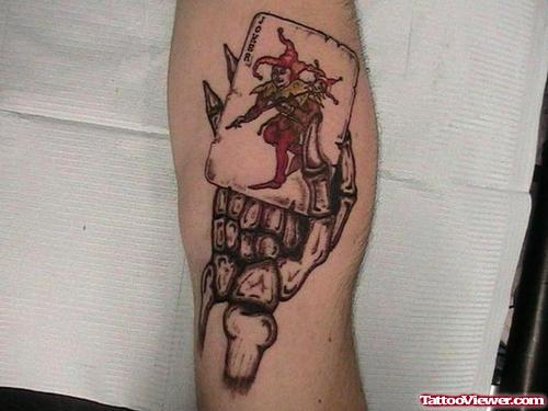 Joker Card In Hand Gambling Tattoo On Arm