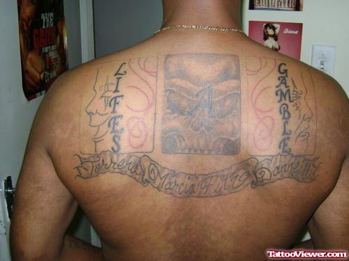 Gambling Tattoo On Man Upperback